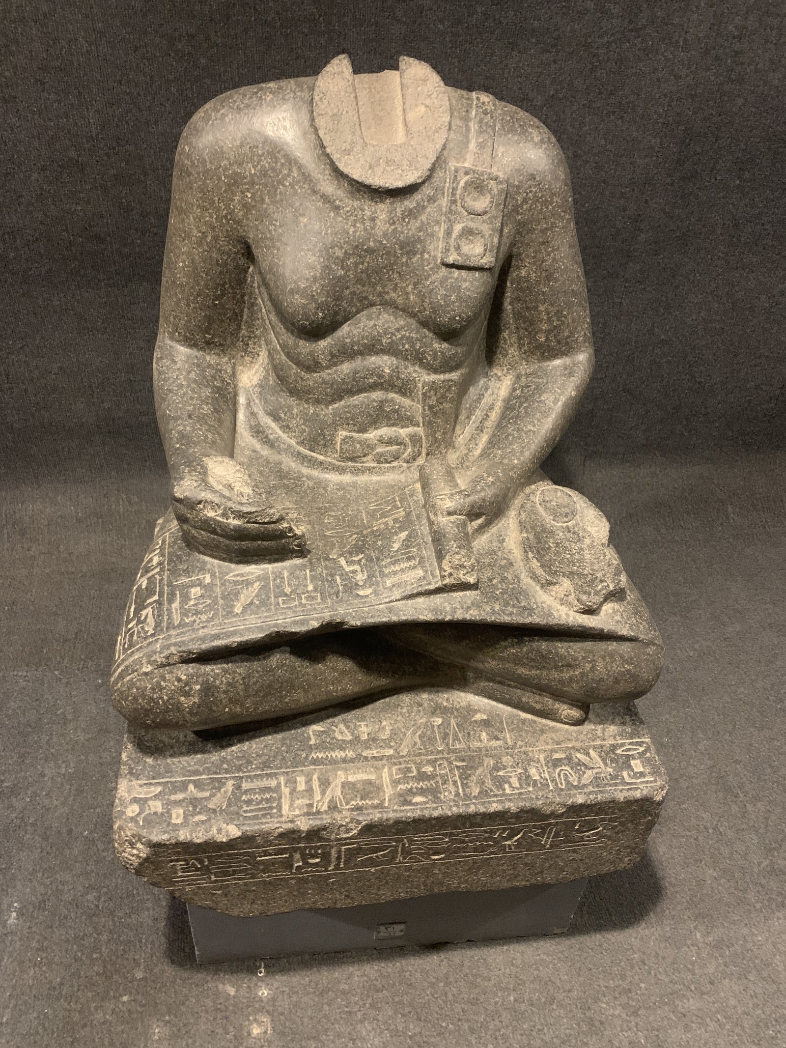 Seated statue of Mentuhotep displayed in Luxor Museum