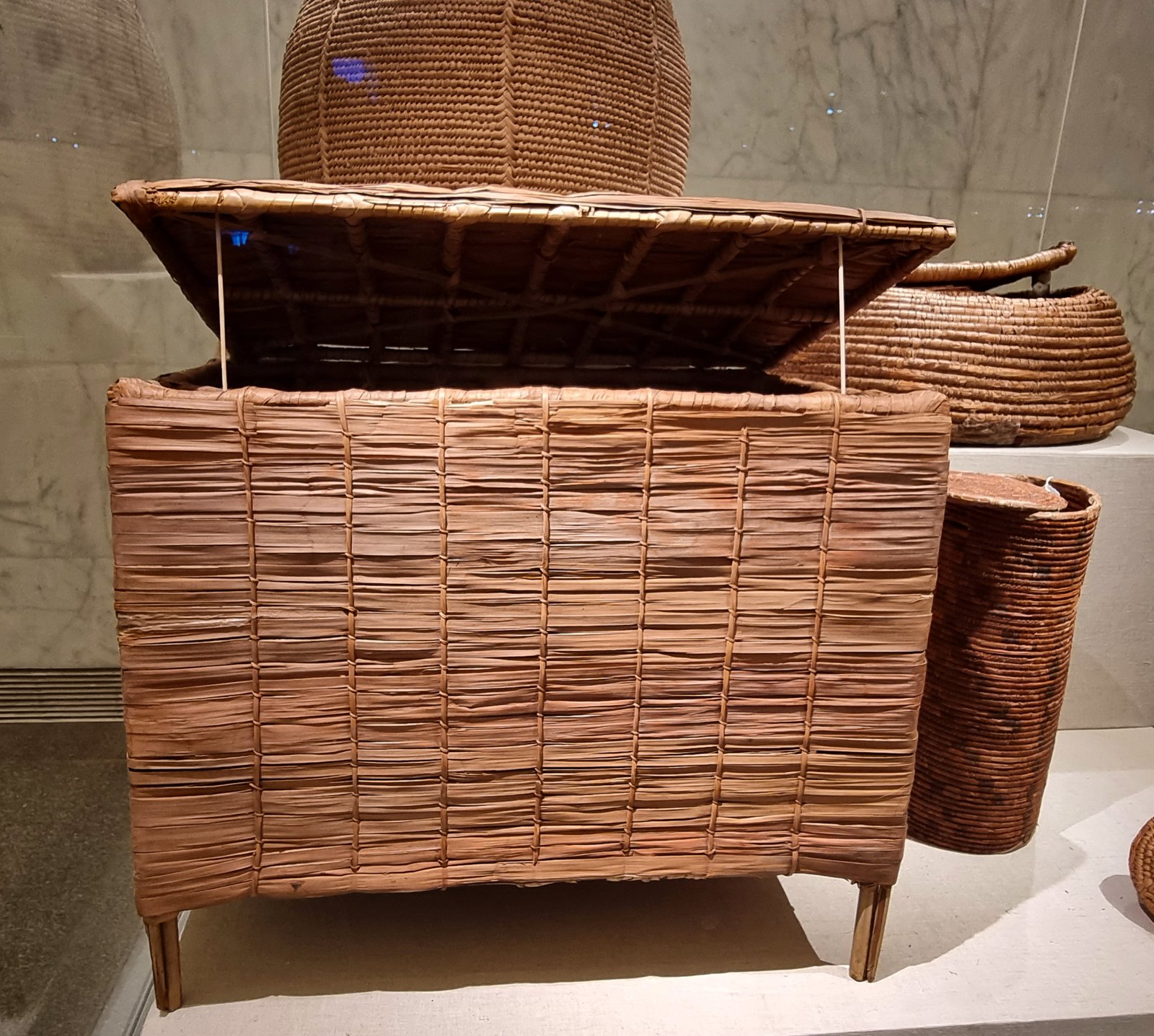 Ancient Egyptian wickerwork containers displayed at the National Museum of Egyptian Civilization